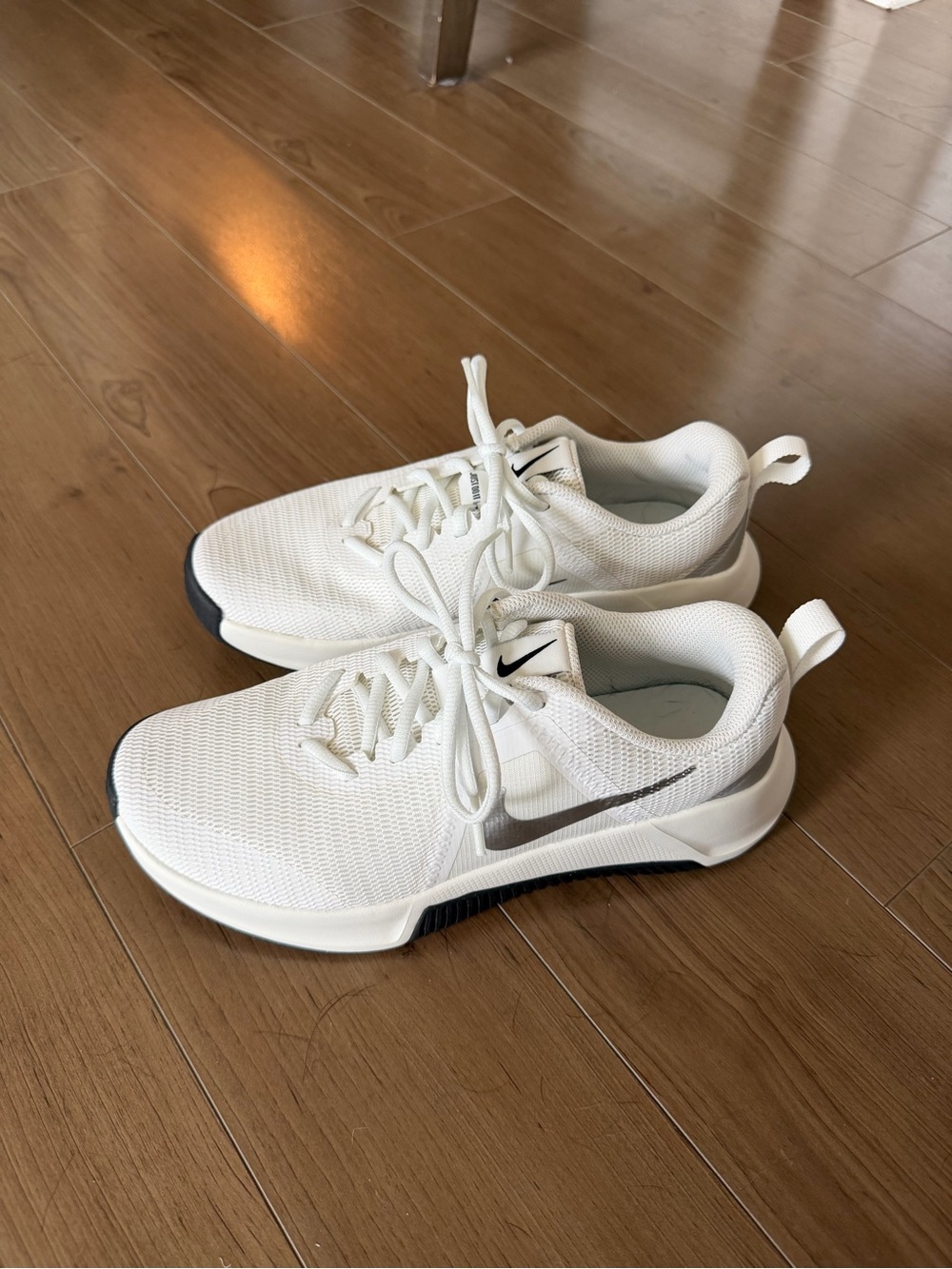 Nike White Mesh Trainers with Black Swoosh